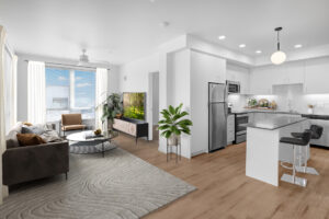 Luxury Living and Stylish Comfort - apartment interior with 9-foot ceilings, luxury wood-vinyl plank flooring, luxury kitchen, and a spacious living area